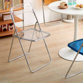 Modern collapsible open back side chair made of plastic and acrylic, ideal for kitchen and dining areas